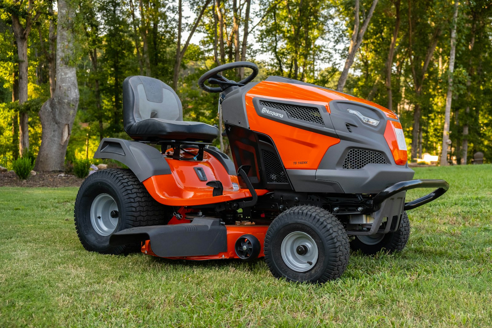 Zero-turn mower parked on cut grass